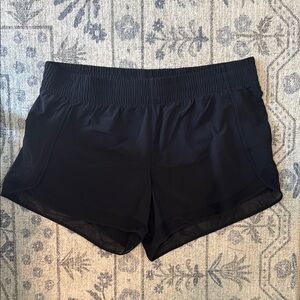 Black Athleta Mesh Racer Run Mid Rise 4 inch Shorts